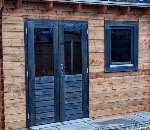 Double doors and window stained dark wood
