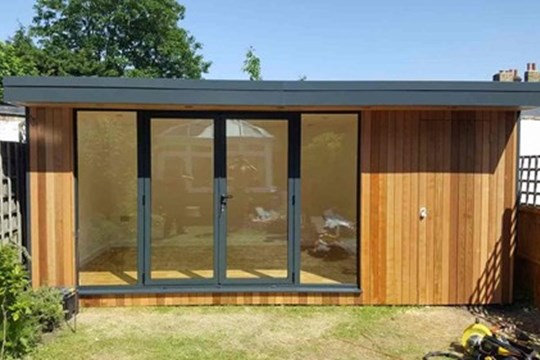 Timber garden room with large glass doors